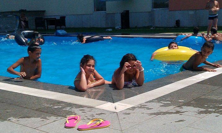 Our children at the swimming pool image